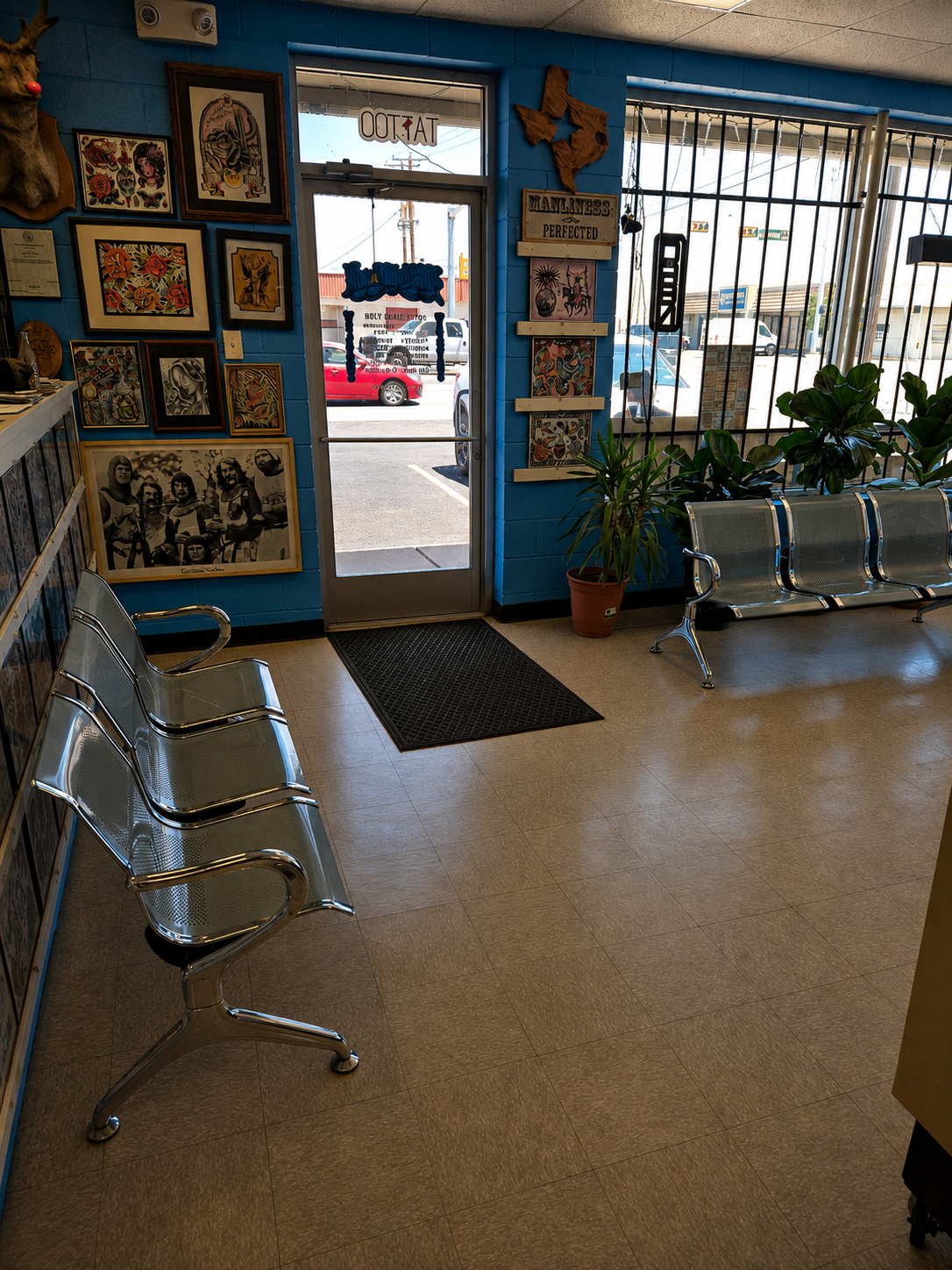 The bright front entrance and waiting area of A Holy Grail Tattoo